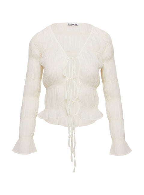 back view of model wearing Princess Polly Carnelian Frill Long Sleeve Top Cream Full Sleeves V-Neck 