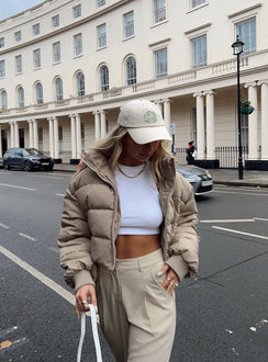 Puffer jacket Oversized fit Zip front fastening High neckline Relaxed sleeves with elasticated cuffs Single internal pocket Fully lined