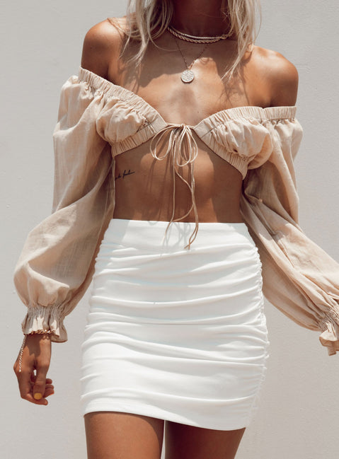   front view of model wearing Princess Polly Benji Mini Skirt White 