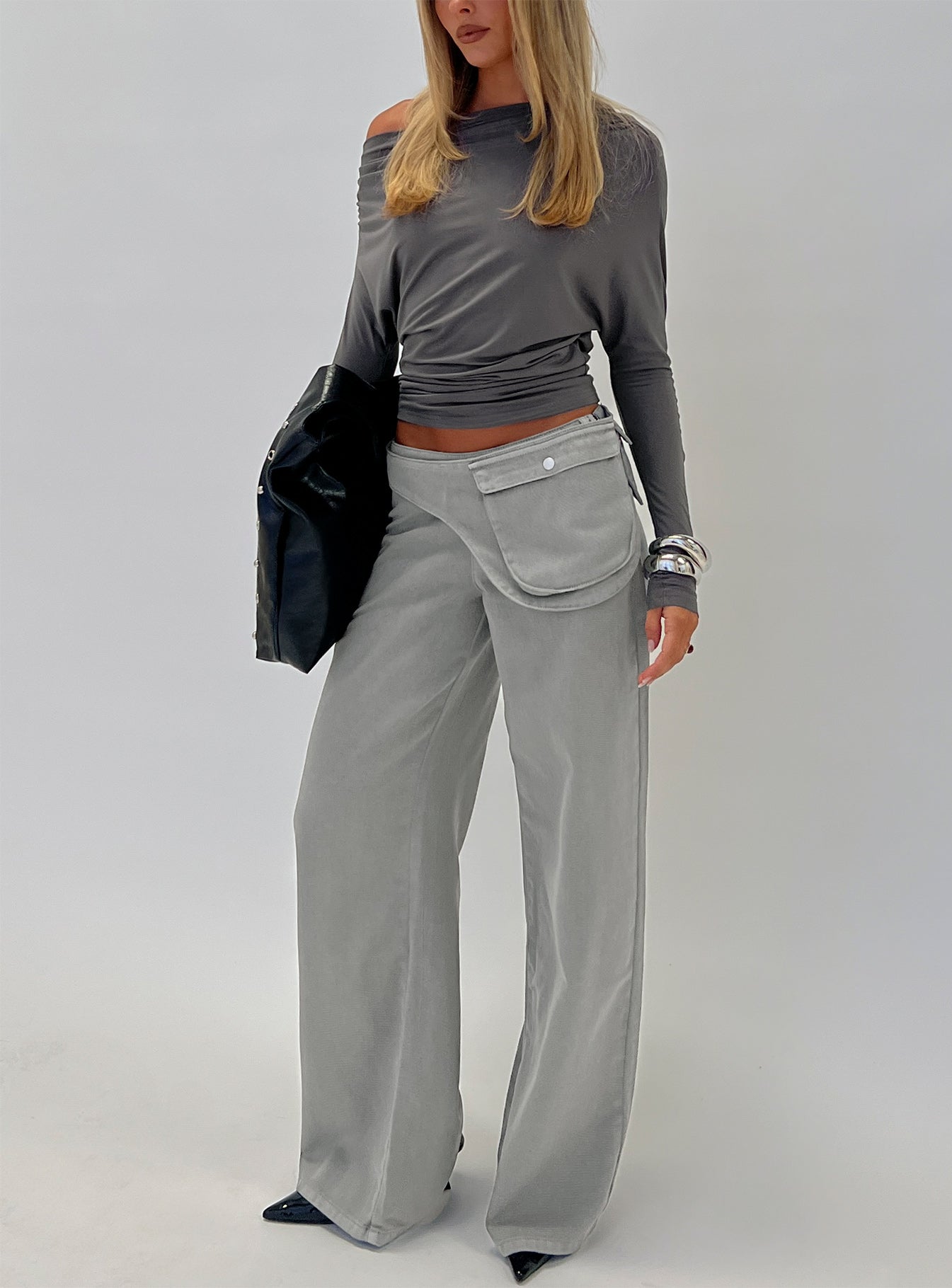 front view of model wearing Princess Polly Incognito Low Rise Wide Leg Cargo Jeans Grey Low Rise Jeans 