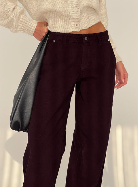 back view of model wearing Princess Polly Jacynda Low Waist Wide Leg Corduroy Jeans Currant Mid Rise Jeans 