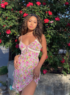 side view of model wearing Princess Polly Emilee Mini Dress Pink Floral Sweetheart Neckline 