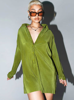 Green romper Silky material  Pleated design  Classic collar  Button front fastening  Drop shoulder  Button fastening at cuffs Raw cut hem 