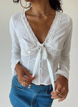 Long sleeve shirt Embroidered detail material V neckline Button and tie fastening at front Knit lace throughout