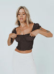 Crop top  Slim fitting  Princess Polly Exclusive 100% rayon  Can be worn on or off the shoulder  Elasticated neckline  Frill trim Shirred waist  Good stretch  Unlined 