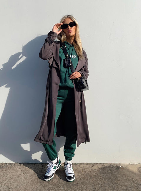 Trench coat Relaxed fit 100% polyester Wide lapel collar  Double-breasted front Tie fastening at cuffs  Belt loops with detachable belt Twin hip pockets