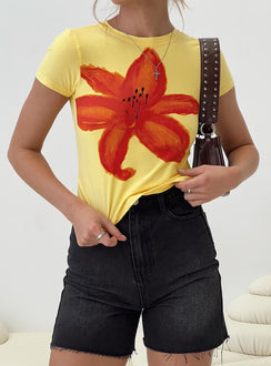 Graphic print tee Cap sleeve, adjustable cut-outs at back with tie fastening