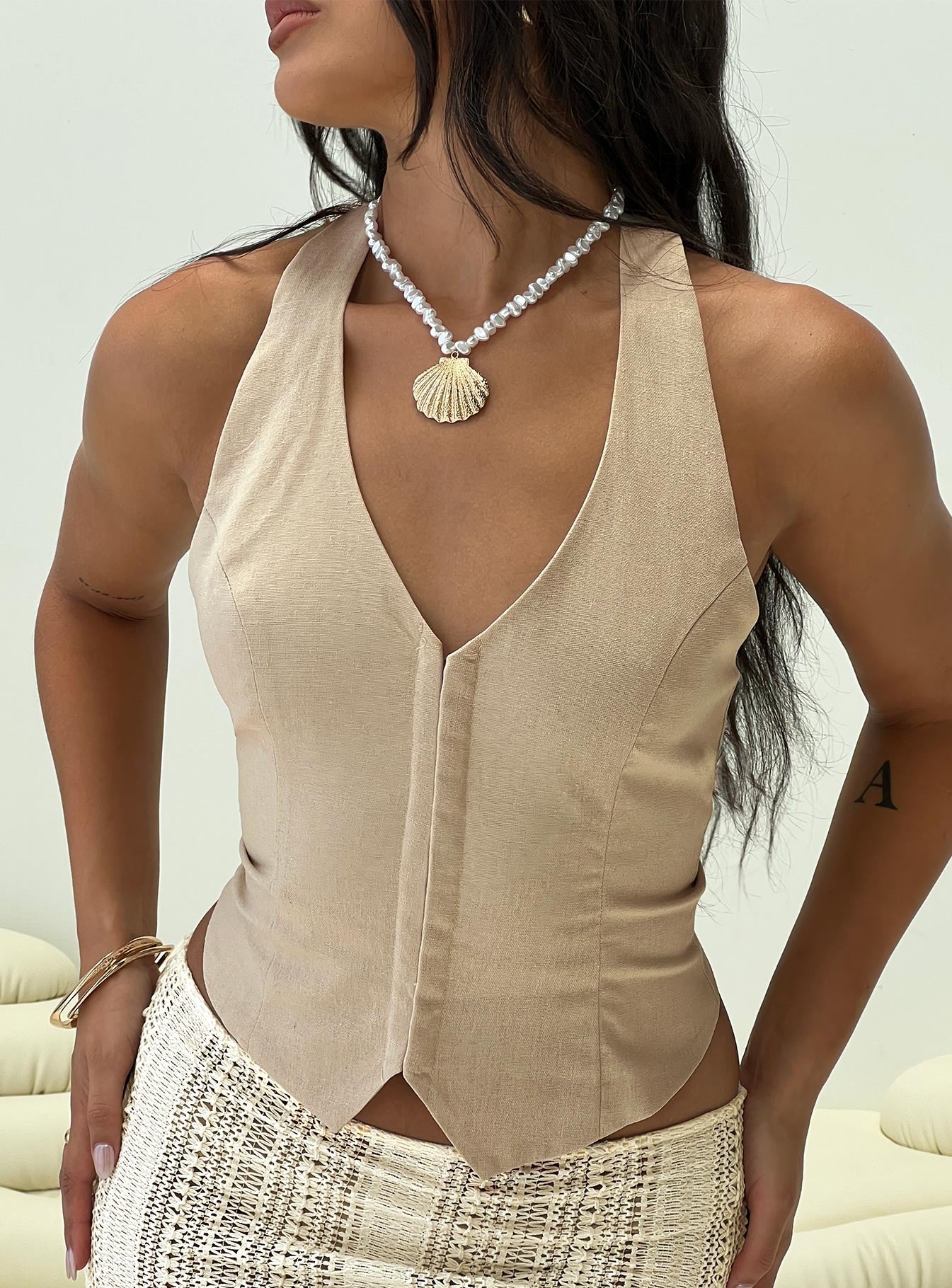 Halter top Fixed halter strap, hook & eye fastening down front, lace up back with tie fastening