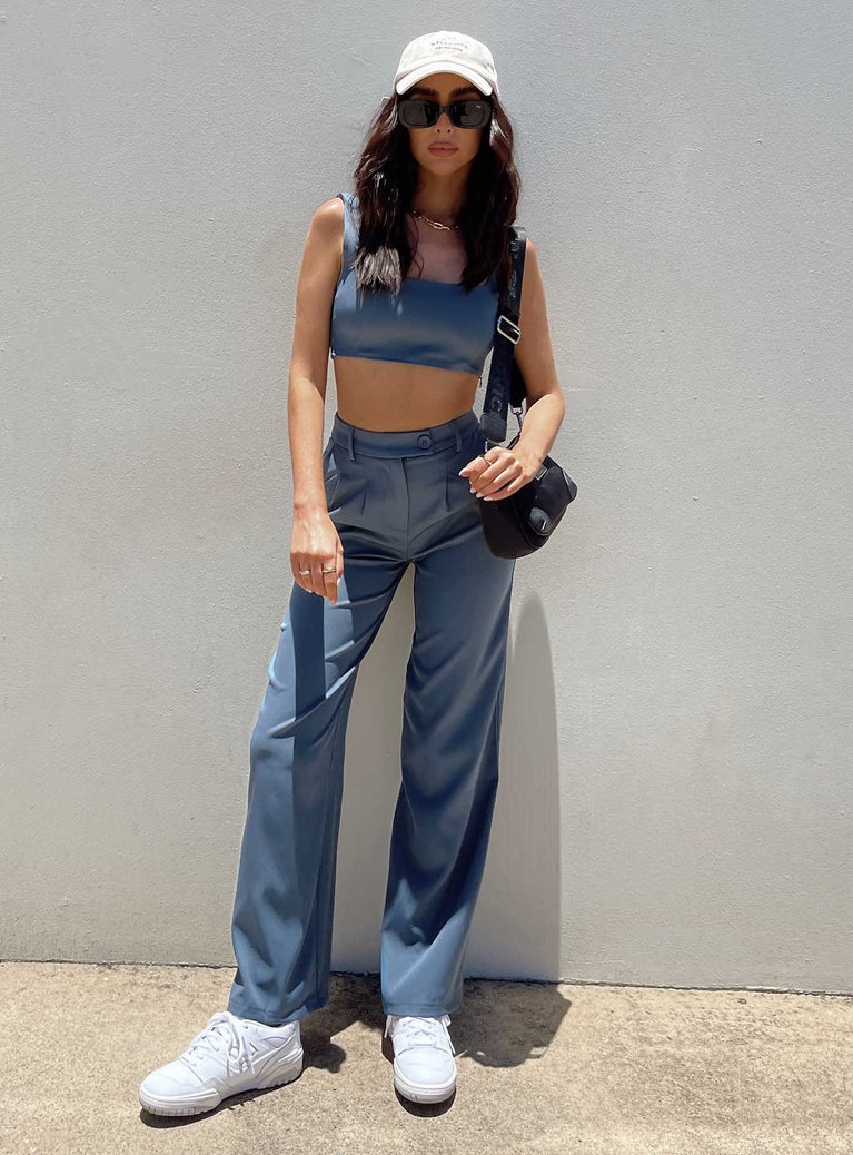 Matching set Crop top Fixed straps Invisible zip fasting at side High waisted pants Wide relaxed leg Belt loops at waist Zip & button fastening