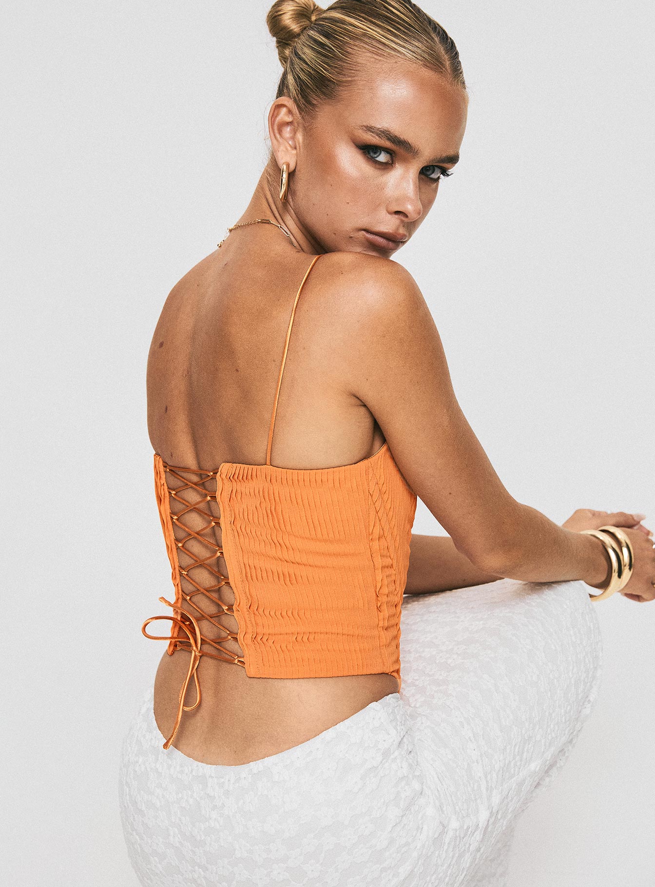 Orange Plisse corset Fixed shoulder straps, square neckline, lace up fastening at back, curved hem, invisible zip fastening at side, boning throughout