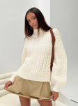 Turtle neck cable sweater Drop shoulder, ribbed cuff and waistband Good stretch, unlined 