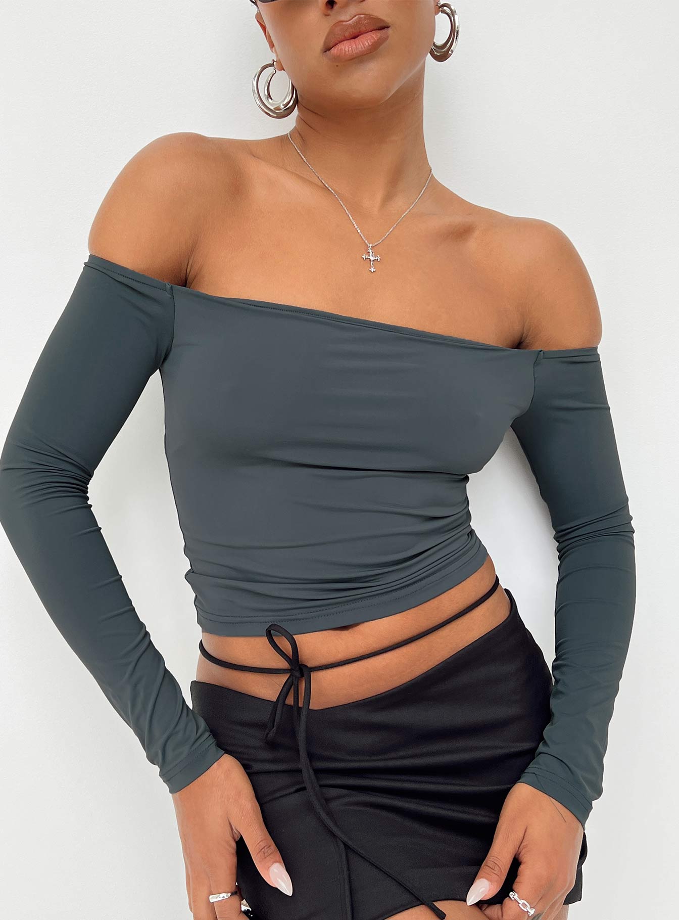 Long sleeve top Off the shoulder design Good stretch Unlined 