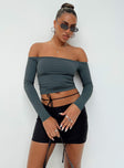 Black mini skirt Low rise Asymmetric waist Tie fastening at waist Invisible zip fastening at side