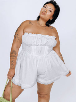 Strapless romper Lace details Ruffle neckline  Adjustable tie at neckline  Shirred back  Twin hip pockets  Non-stretch