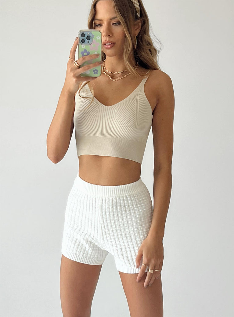 Shorts Knit material  High waisted  Elasticated waistband  Good stretch  Unlined 