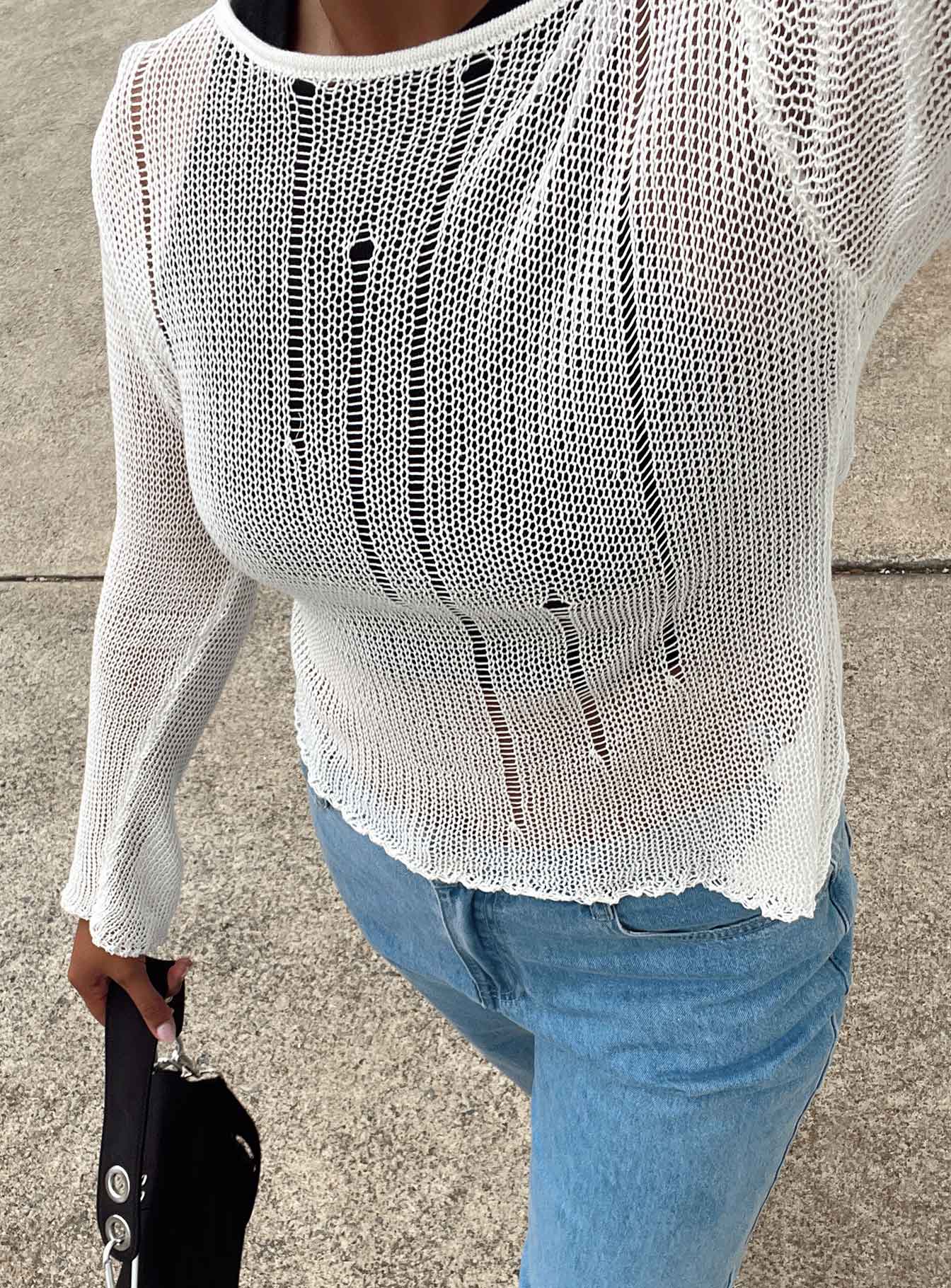 Sweater Sheer knit material Wide neckline Asymmetrical hem Good stretch Unlined 