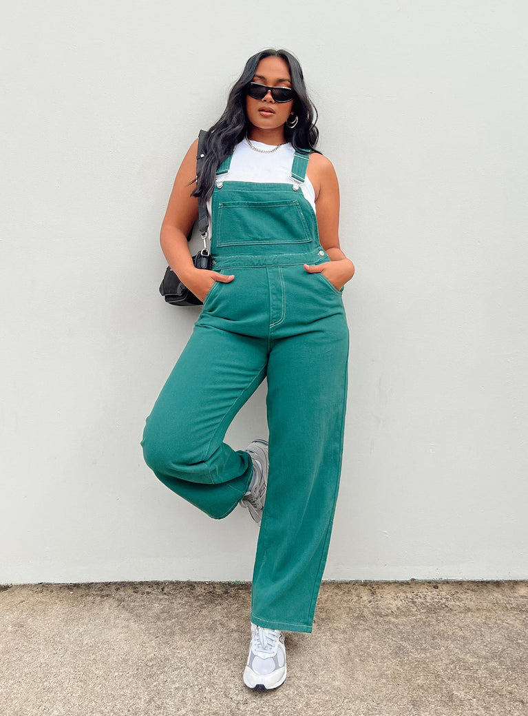 Green overalls Contrast stitching Adjustable shoulder straps  Large chest pocket  Four classic pockets  Button fastening at hips  Wide leg