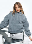Sweater Teddy material Quarter zip fastening at front Large front pocket Drawstring waist Elasticated cuff
