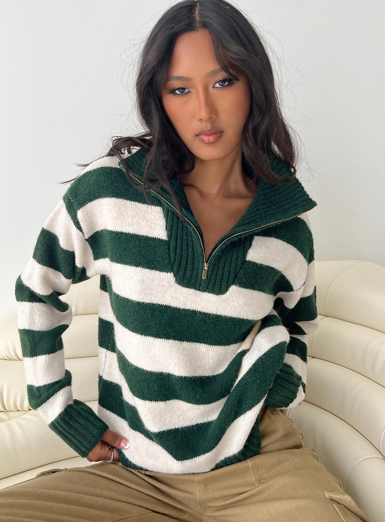 Knit striped sweater Quarter zip fastening at front, high neckline, drop shoulder Good stretch, unlined 