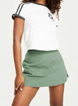 Skort Slim fitting, low rise Invisible zip fastening at back, built-in shorts, slit at side Non-stretch, fully lined