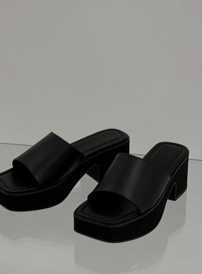 Sandals Lining: 100% Recycled PU Insole: 100% PU Outsole: 100% Rubber Faux leather material  Single wide upper  Square toe  Platform base 
