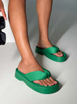 Sandals  Flip-flop style upper  Rounded toe  Padded foot  Platform base 
