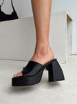 Black mules Faux leather material Single wide upper Block heel Platform base