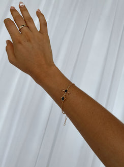 Bracelet Gold-toned Dainty chain Cross charm  Gemstone detail Lobster clasp fastening