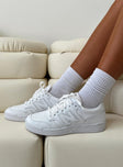 Sneakers Faux leather material Lace up fastening Padded footbed Rounded toe Treaded sole