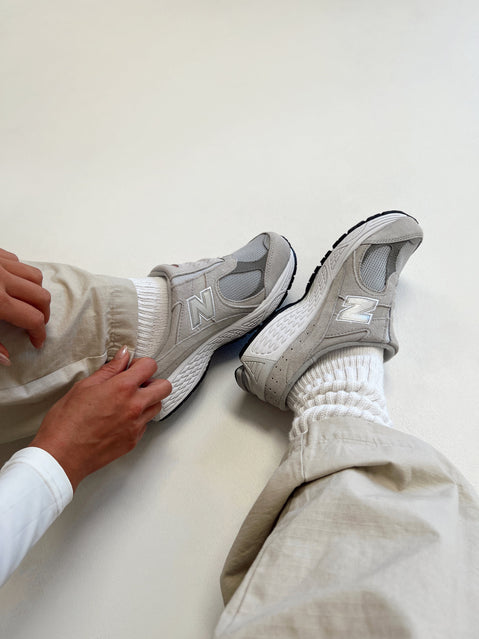 Faux suede sneakers, slip-on style Padded footbed, mesh netting detail, treaded sole