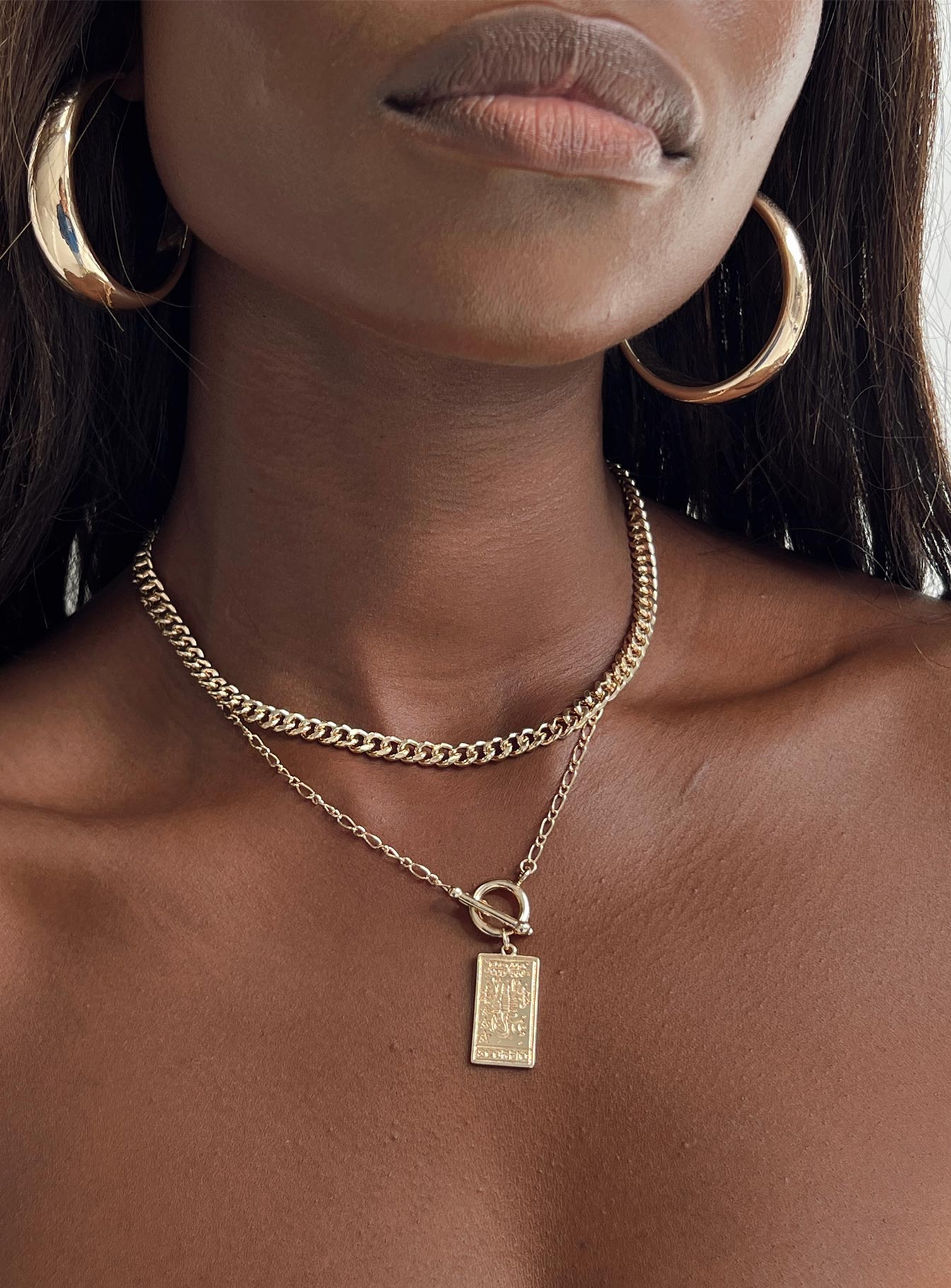 Necklace Gold toned Drop charm Lobster clasp fastening