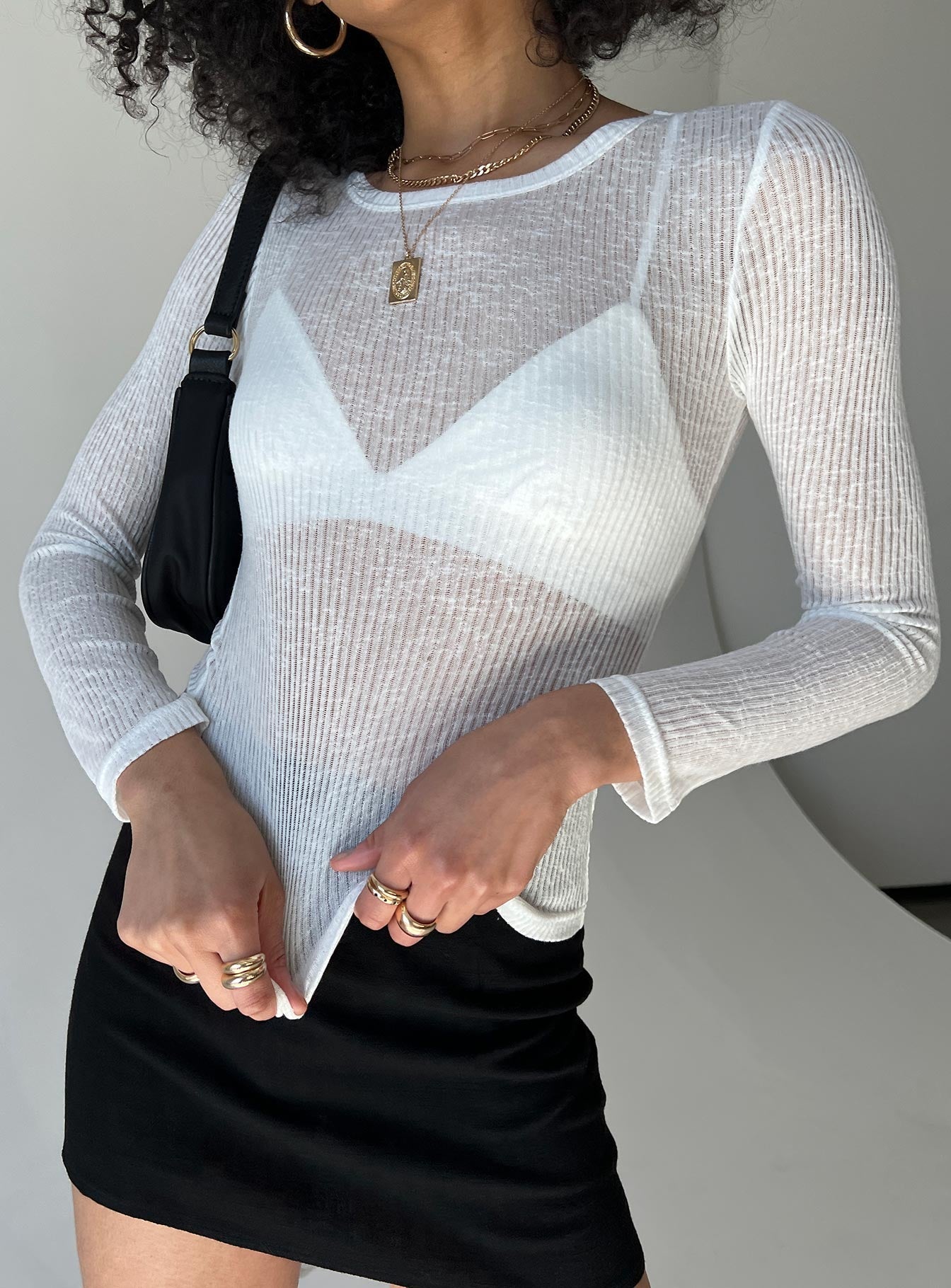 Long sleeve top  Slim fitting  Princess Polly Exclusive 75% polyester 25% rayon Sheer ribbed material  Good stretch  Unlined   