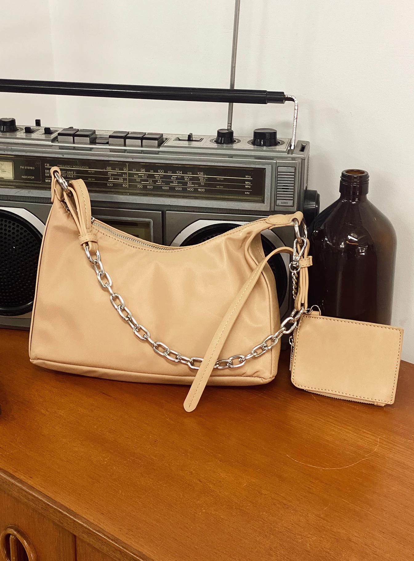 Crossbody bag  Princess Polly Exclusive Nylon & faux leather material  Silver-toned hardware  Chain shoulder strap  Removable & adjustable crossbody strap  Removable coin purse  Zip fastening Flat base 