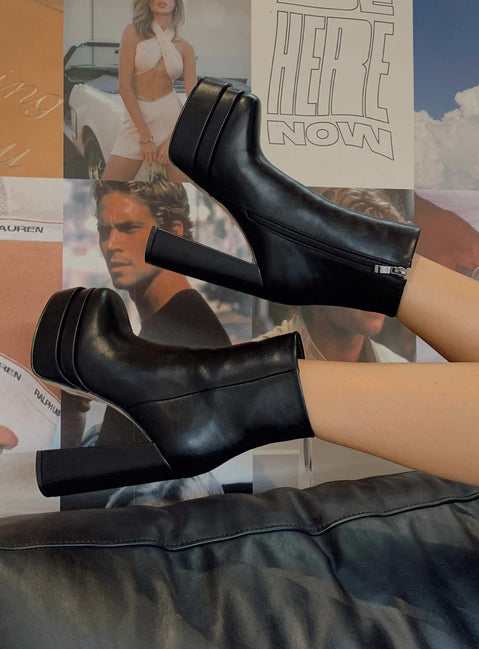 Black boots Faux leather material  Zip fastening at side  Square toe  Platform base  Block heel 