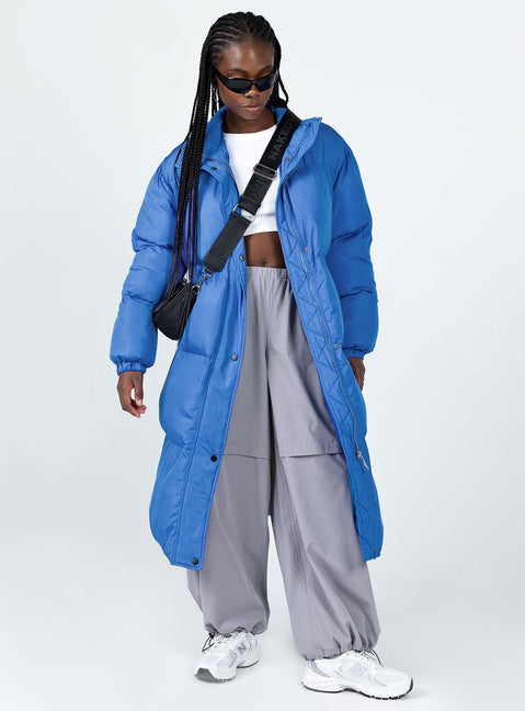 Longline puffer jacket High neck  Zip & press button fastening  Twin hip pockets 