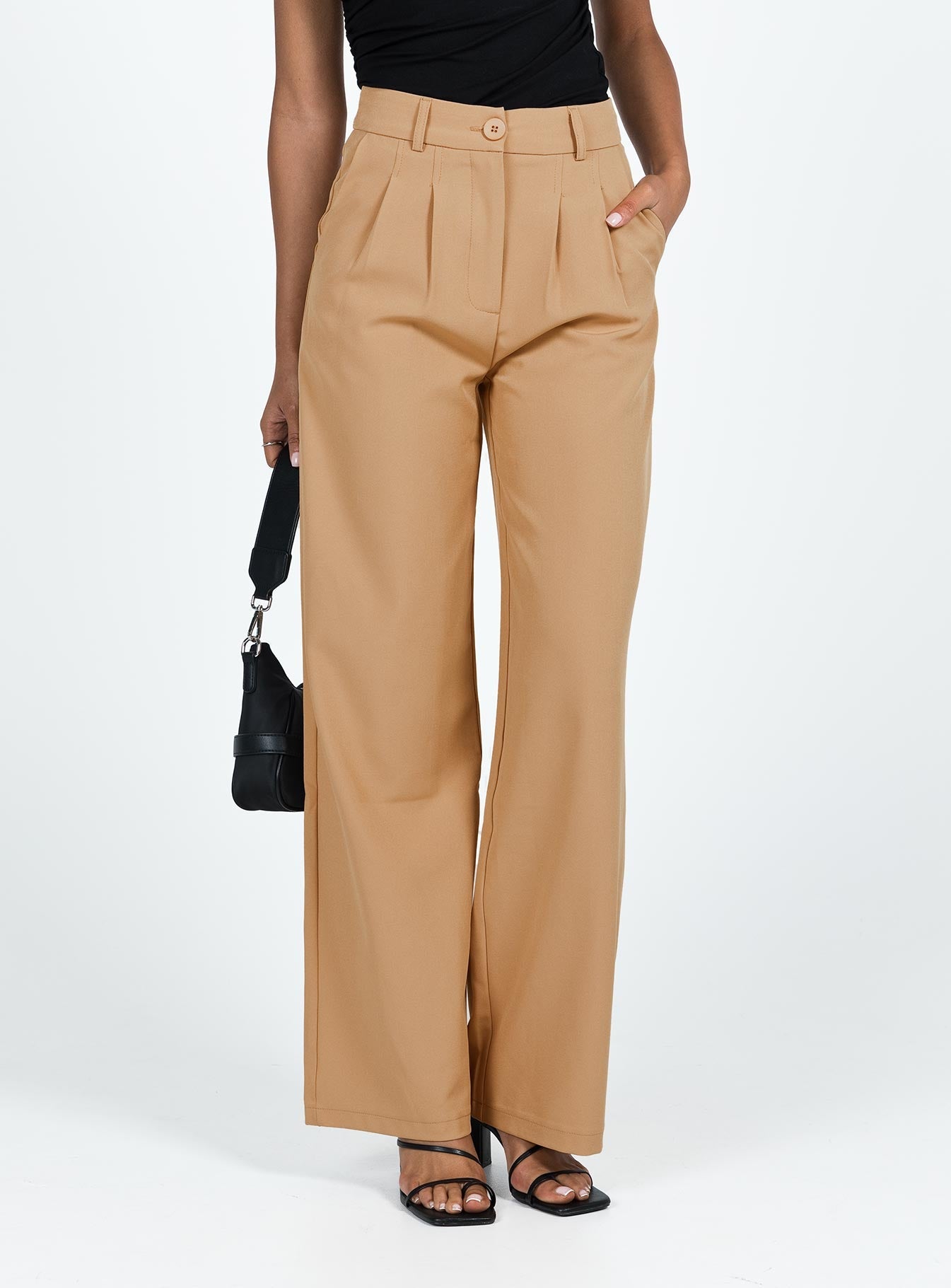 Pants Front button and zip fastening Belt looped waist Subtle pleats at waist Twin hip pockets