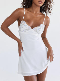 Mini dress Silky material Adjustable shoulder straps Lace trim V neckline Invisible zip fastening at side