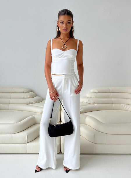 Matching set Crop top Adjustable shoulder straps Sweetheart neckline Zip fastening at back Tailored pants Zip and clasp fastening Twin hip pockets Stuble pleats at waist Straight leg