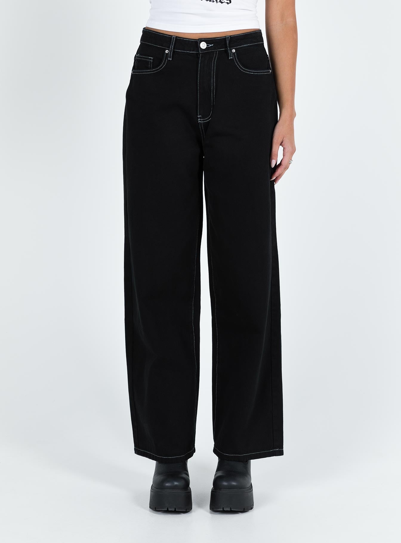 Jeans High rise Black denim Belt looped waist Zip and button fastening Classic five pocket design Branded patch at back Wide leg