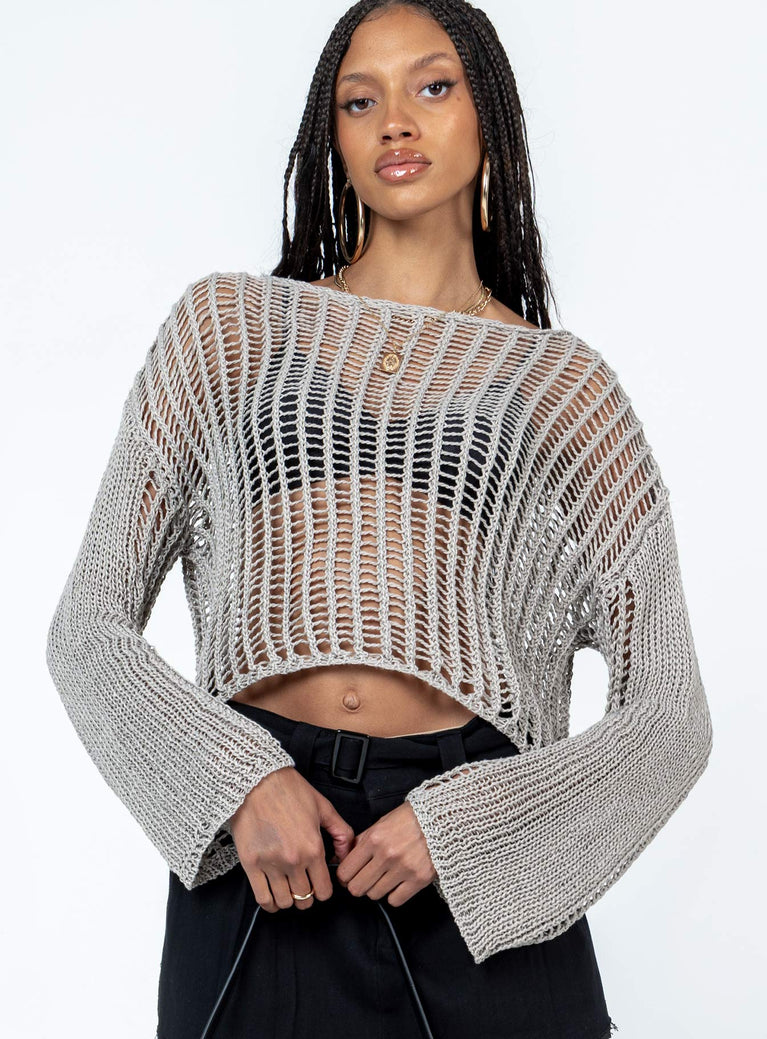 Oversized sweater 100% polyester  Sheer knit material  Wide neckline  Drop shoulder 