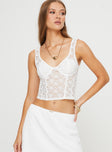 Lace crop top Fixed shoulder straps, v-neckline, boning throughout, zip fastening at back Good stretch, unlined 