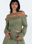 Green long sleeve top Pinstripe print Inner silicone strip at bust Folded neckline Zip fastening at back
