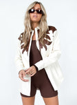 Jacket Faux leather material  Western design  Classic collar  Button front fastening  Rounded hem  Single button cuff 