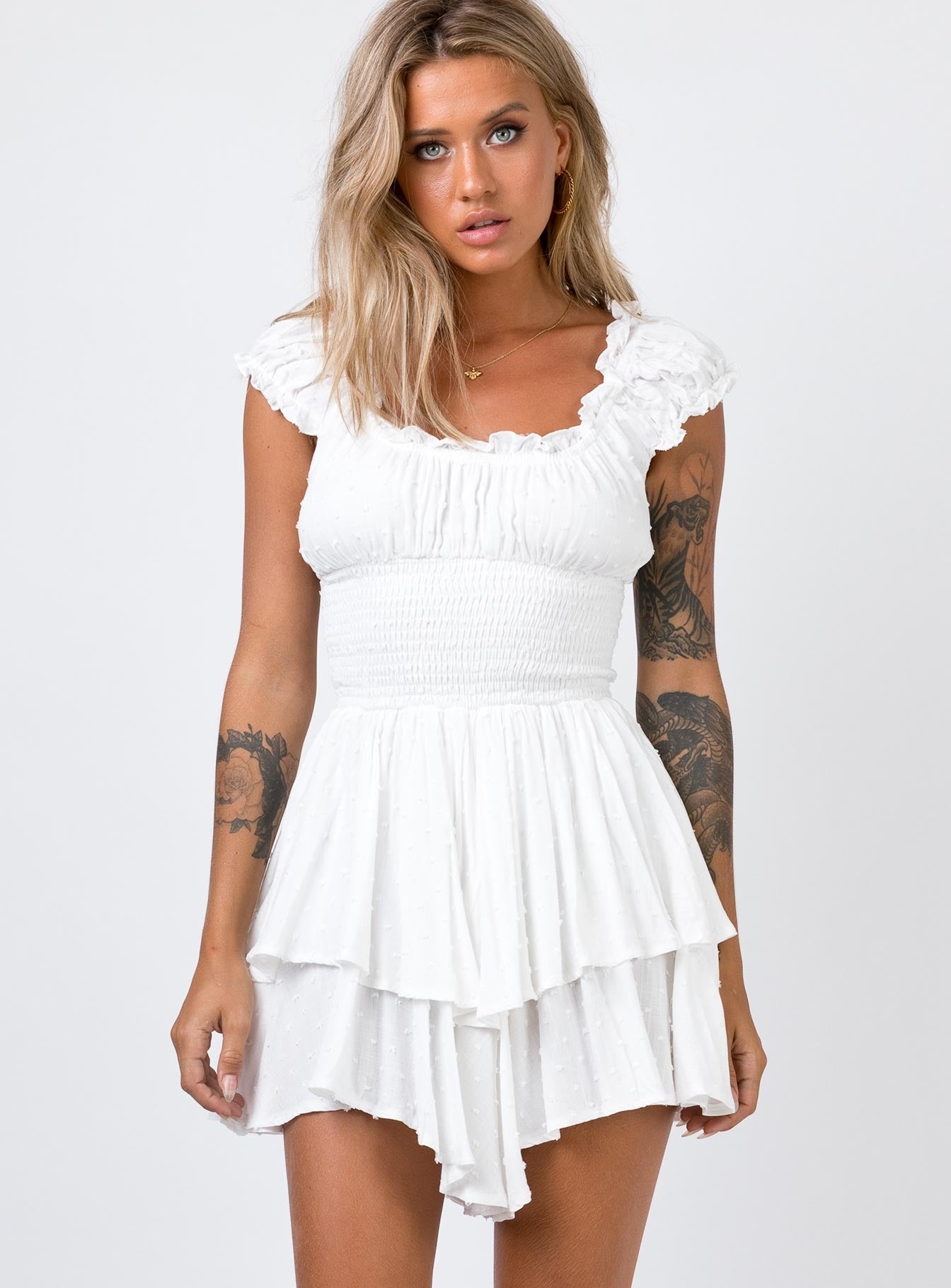 Playsuit Can be worn on or off the shoulder Soft textured material Shirred waistband Ruffle detailing Elasticated neck and sleeves Fully lined