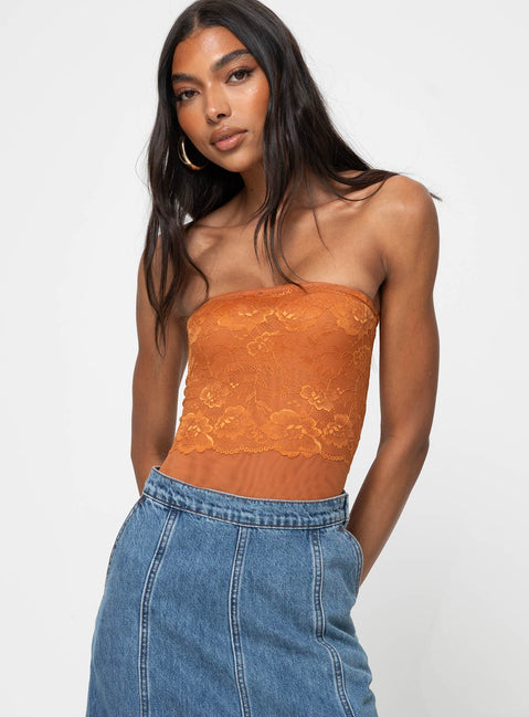 Strapless lace bodysuit Inner silicone strip at bust, cheeky style bottom, press clip fastening, high cut leg Good stretch, unlined 