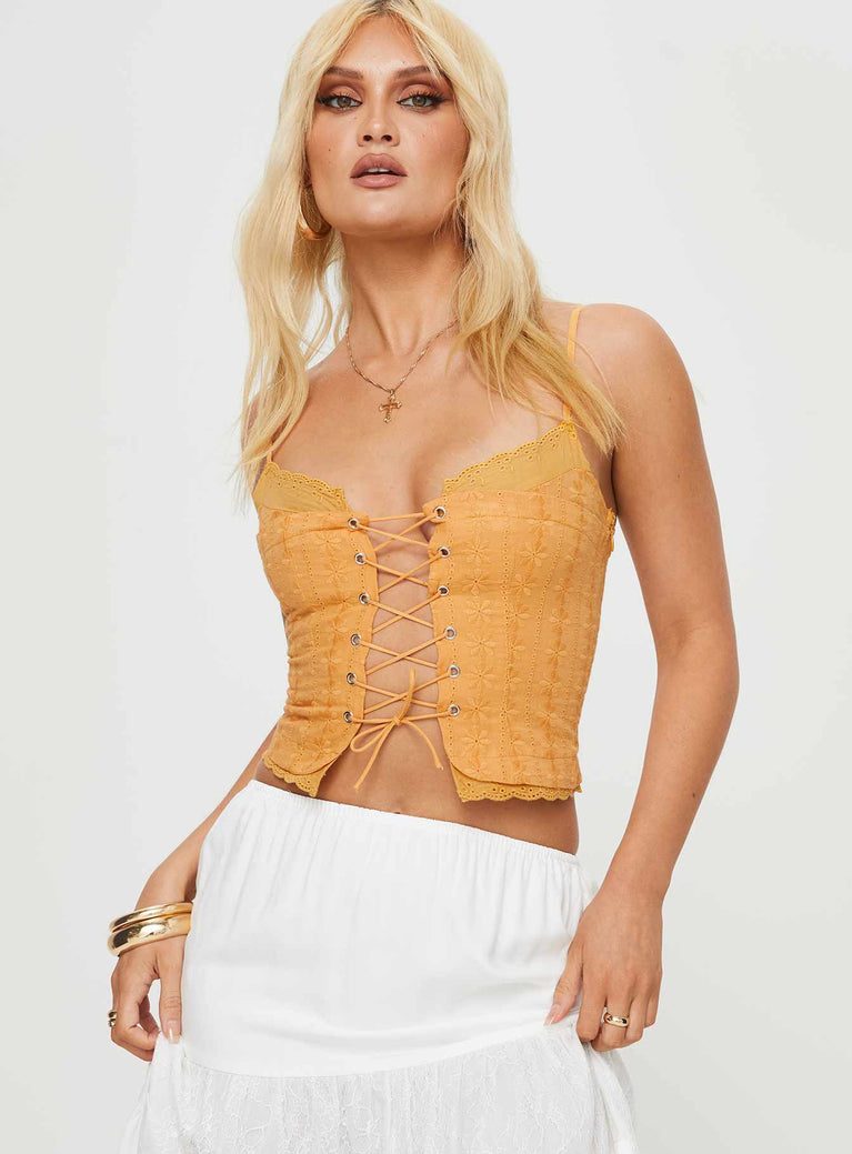 Anglaise crop top Slim-fitting, lace trim detail, adjustable shoulder straps, lace up front with tie fastening, invisible zip fastening at side
