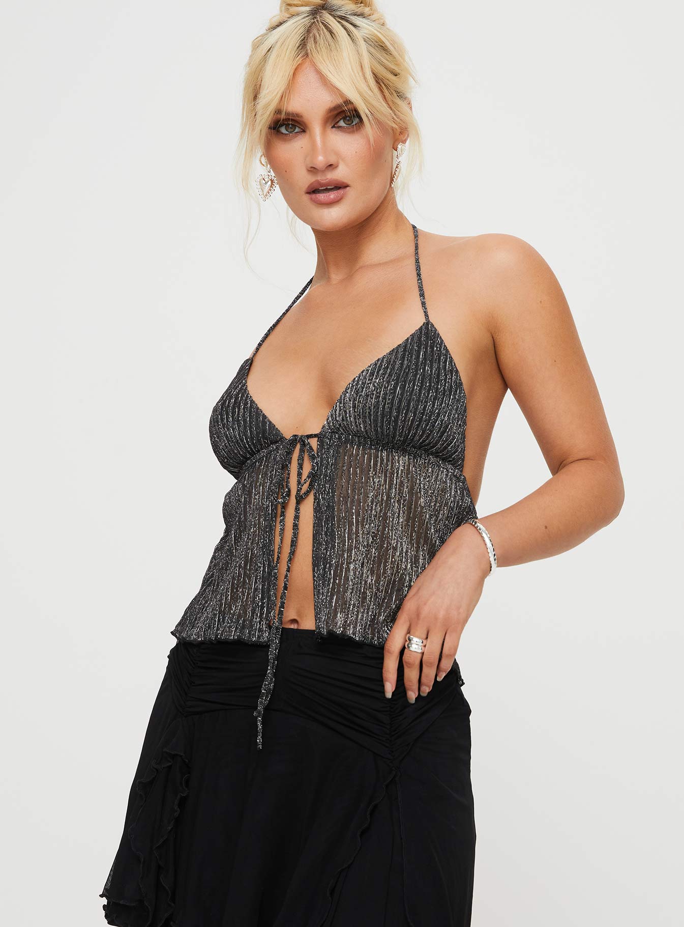 Plisse glitter top Sheer material, plunging neckline, split hem, halter neck tie, tie fastening at bust Good stretch, lined bust