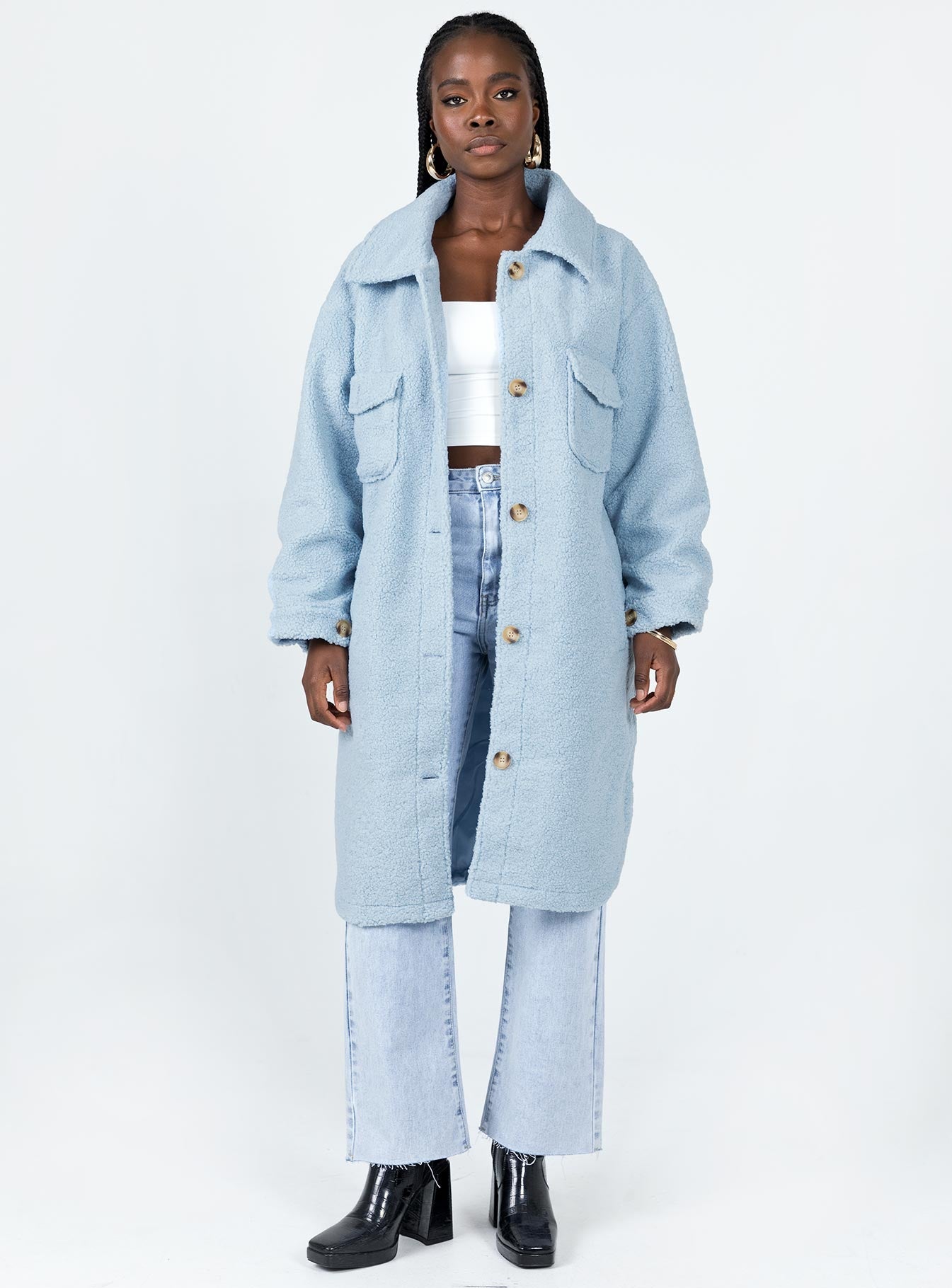 Oversized jacket Faux fur material  Classic collar Button front fastening  Twin hip pockets 