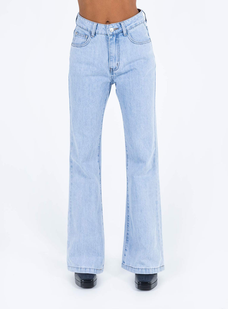 Jeans Cotton Mid wash denim High rise Belt looped waist Classic five pocket design Zip and button fastening Flared leg