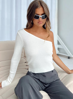 One shoulder top Ribbed knit material  Raw hem  Slightly sheer Good stretch 